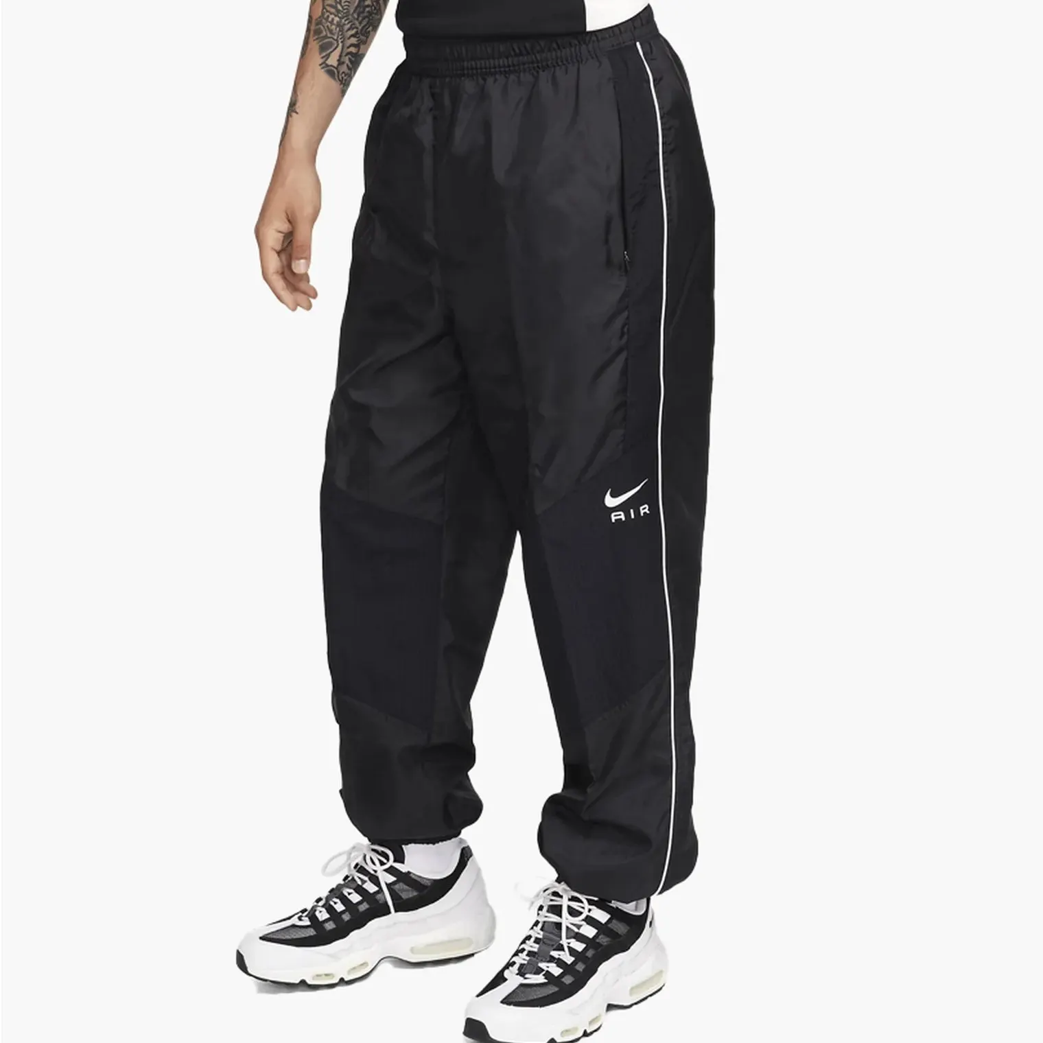 Штани Чоловічі Nike Air Men's Woven Trousers Black/Summit White FN7688-010