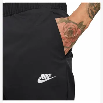 Штани Чоловічі Nike Club Woven Tapered-Leg Pant Black/White DX0623-010