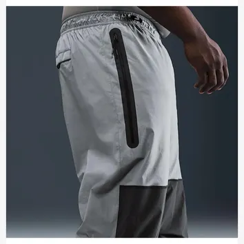 Штани Чоловічі Nike Tech Men's Woven Oversized Trousers Cool Grey/Anthracite/Black HM7158-065