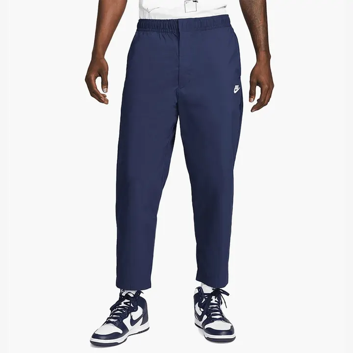 Штани Чоловічі Nike Sportswear Sport Essentials Woven Unlined Sneaker Pants Blue DM6823-410