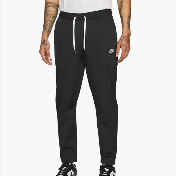 Штани Чоловічі Nike Club Woven Tapered-Leg Pant Black/White DX0623-010