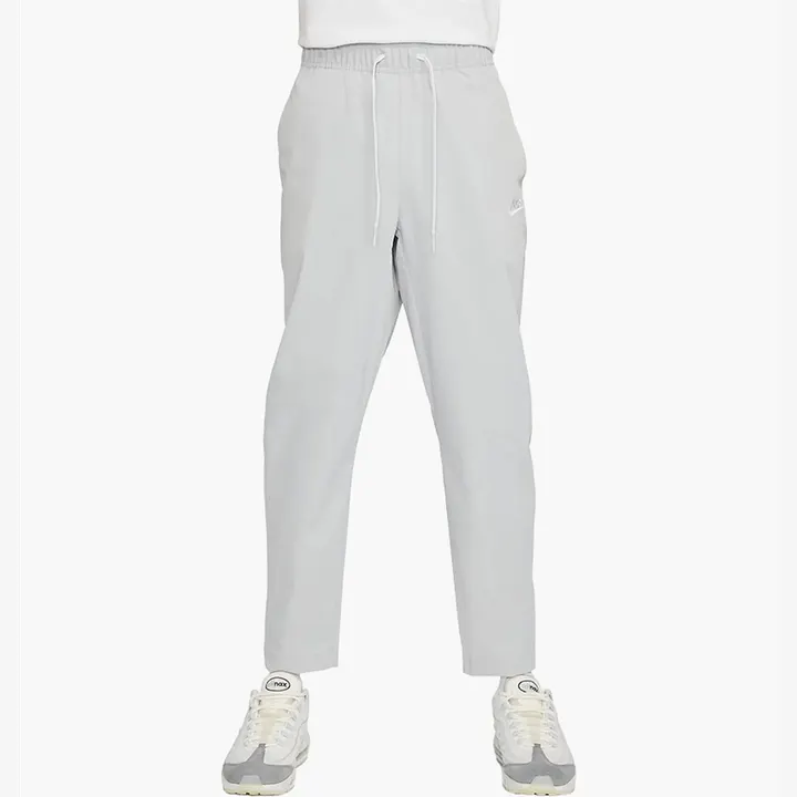 Штани Чоловічі Nike Club Woven Tapered Leg Pants Light Smoke Grey/White DX0623-077