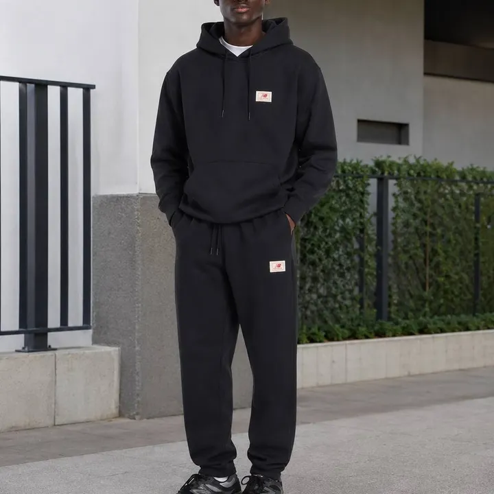 Спортивний костюм чоловічий New Balance Label Black MT53804BK__MP53802BK